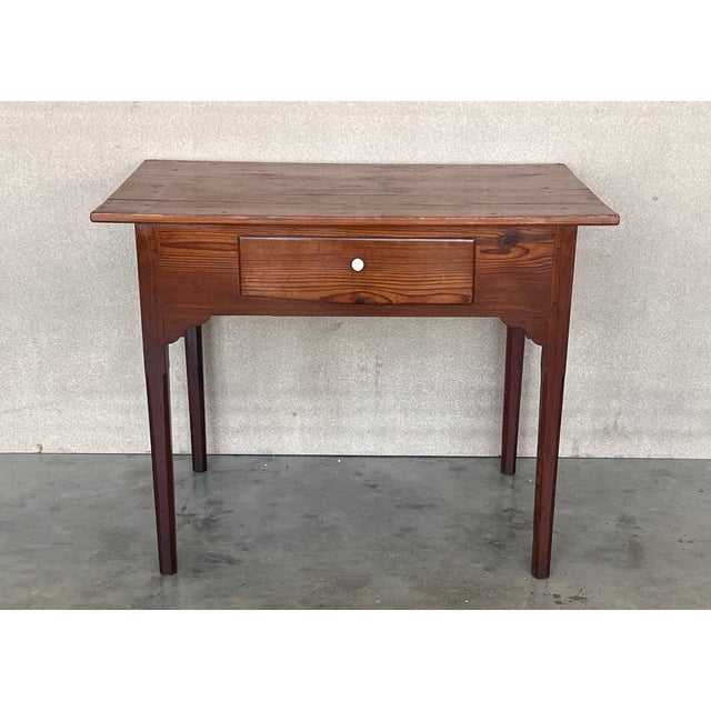 Spanish Country side table with drawer. Made of antique pine called "mobila", this table is very functional and you can...