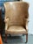 Design Plus Gallery presents a Studded Leather Wingback Chair in the George II Style. The chair has enclosed sides that...