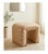 A sculptural vintage waterfall vanity stool featuring a continuous curved profile and fully upholstered pastel pink-and-...