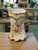 This Antique Royal Devon S.& F. Co. England hand-painted floral gilded pitcher is a stunning piece of porcelain art from...