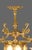 A luxurious contemporary French Louis XVI-style gilt bronze and crystal chandelier, handcrafted with refined neoclassical...
