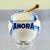 An earthenware Amora moutardier, or mustard pot, with a wooden serving paddle, made by Digoin Sarreguemines, circa 1930s –...