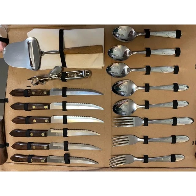 This is a NEVER-USED stainless steel, steak knife, and carving set made for six. It is circa 1970, and UNITED STATES MADE...