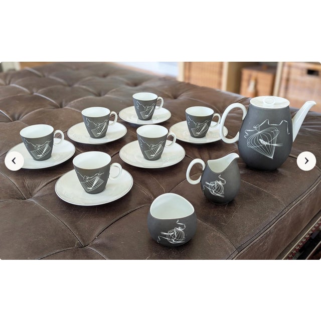 This is a rare and striking Johann Haviland Bavaria "Papageno"porcelain tea set, featuring a bold modernist matte charcoal...