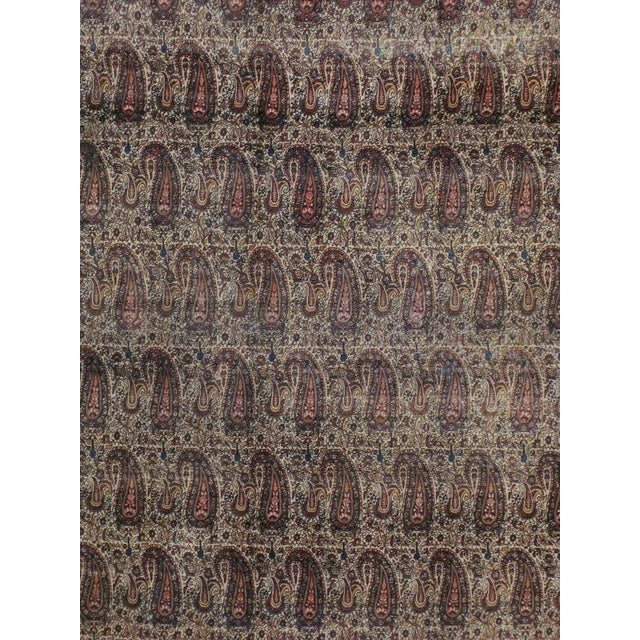 A late 19th Century Persian Lavar Kerman worn Rug