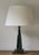 Vintage black wooden table lamp with a heavy patina. This rustic wooden lamp has a bronze stem, has been newly re wired to...