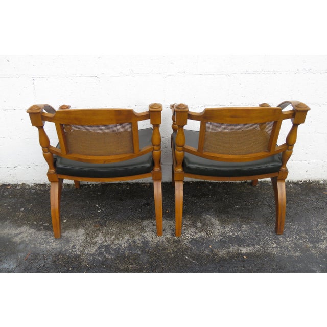 This Pair of Side Chairs are made out of wood, solid wood, caning, and vinyl. The Chairs were made by Lenoir and they are...