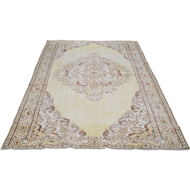 Vintage Turkish Anatolian whitewash hand knotted rug with natural colors and fine weave.