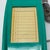 A vintage 1980s or 1990s trimline telephone, in a striking bright teal color. Good vintage condition.