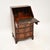 A smart and useful antique Georgian style writing bureau. This was made in England, it dates from around the 1950’s. The...