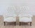 Striking pair of French high back chairs dating from the early 20th century. Featuring elegant proportions and a...