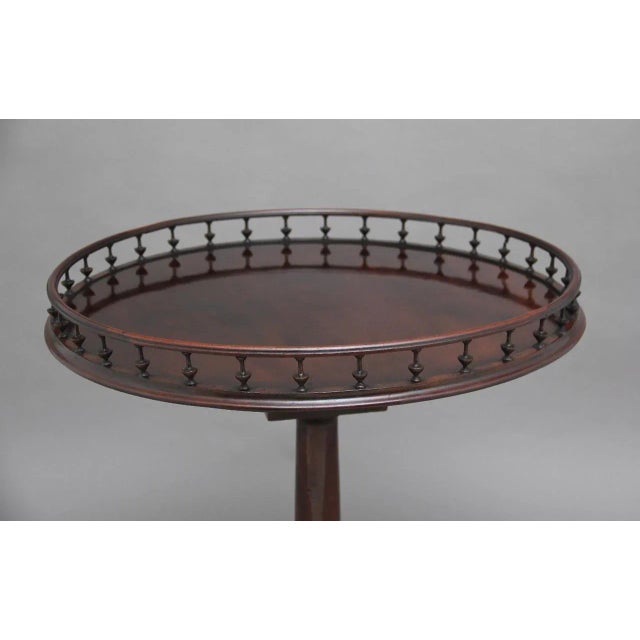 - 18th-century mahogany tripod table - Wonderfully figured top decorated with a gallery around the edge - The gallery...