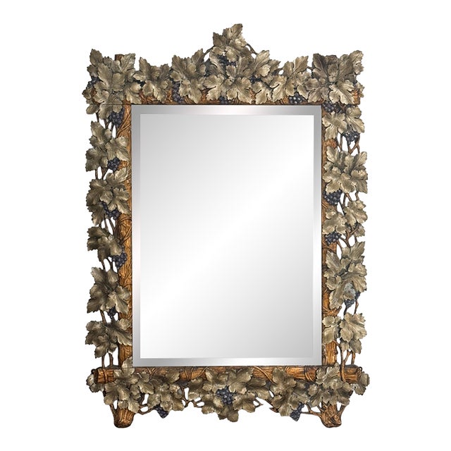 Large Continental Mirror With Beveled Glass and Grapevine Motif For Sale