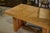 A powerful oak dining table, typical of french furniture production in the 1940s. A large, thick top with clean edges...