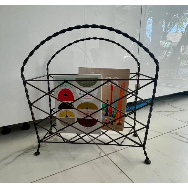 This is a vintage French style wrought iron rack that can be used for magazines or even fire wood. I love this charming...