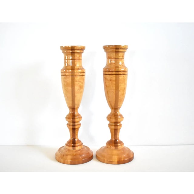 A pair of vintage hand-turned wood candlesticks (or candle sticks), in a light bird's eye maple with a nice luster, and...