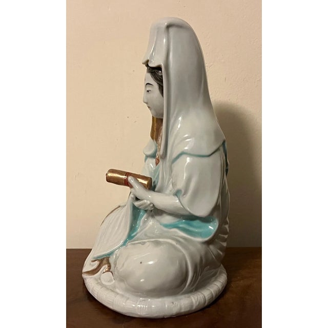 Large antique 19th century Japanese Meiji porcelain figure of a goddess or Guanyin dressed in robes and holding a scroll....