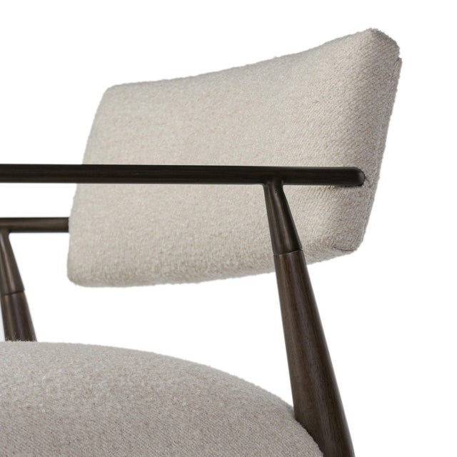 Slim and sculptural. Angular framing features a mix of bronze-finished metal and solid rubberwood, for a forward-thinking...