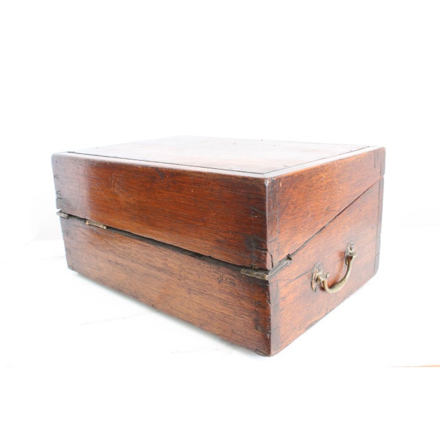 Early 20th Century French handmade writing desk. Entirely hand carved with dovetail joinery. Antique brass hardware. WE...