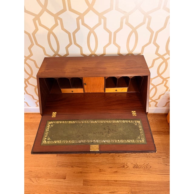 This is a beautifully timeless Mahogany Bureau with shell and herringbone inlay Soto atop bracket feet. This piece...
