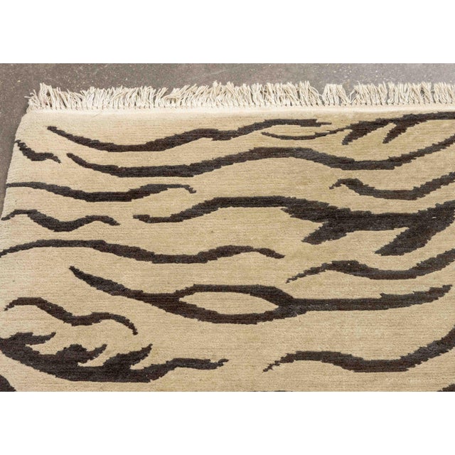 Tibetan Style Tiger Stripes Pattern Wool Carpet, greige ground with black stripes. 9' L x 6' W. Provenance: From a Sutton...