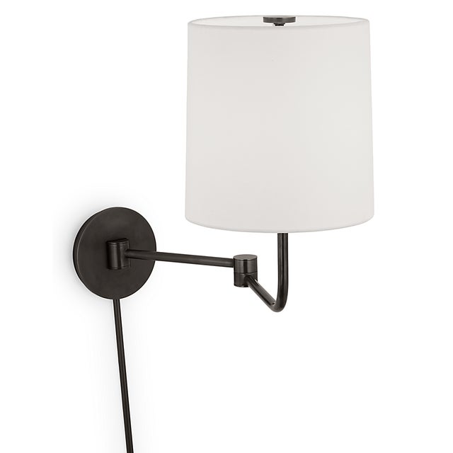 Go Lightly Swing Arm Wall Light in Bronze with Linen Shade Designer: Barbara Barry Finish: Bronze Height: 15.75" Width:...