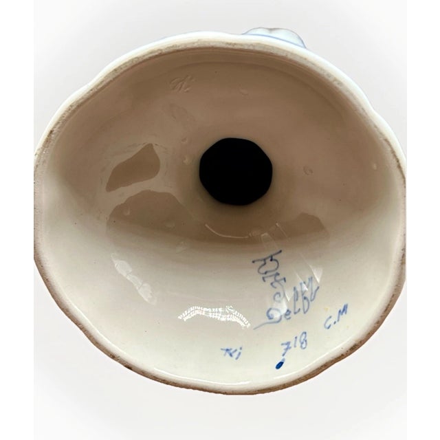 A.A. Visser Dutch Royal Delft Blue Hand-Painted Tulip-Shaped Candlesticks Add a touch of classic Dutch artistry to your...