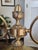 Dazzling mid-century table lamp crafted from brass with two globe shades. Features a lovely scrolling, double arm design...