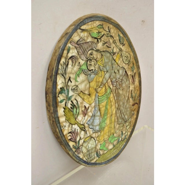 Early 20th Century Antique Persian Iznik Qajar Style Ceramic Pottery Oval Tile Couple Embrace C3 For Sale - Image 5 of 9