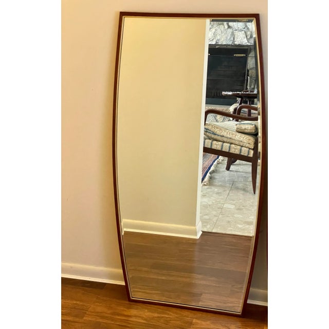 2 available at the moment. A mirror by Helen Hobey Baker. Built of a walnut trim, gold/brass interior liner and bevelled...
