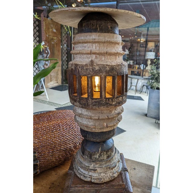 A pair of wonderful eye-catching antique ox cart wheel hubs that have been converted into lamps. These are estimated to be...