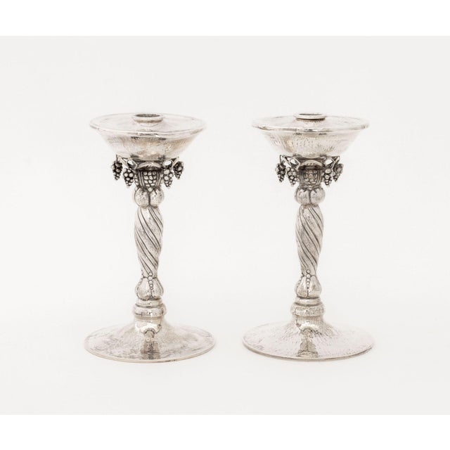 Pair of Michael Strauss Hammered Sterling Silver Grapevine Motif Candlesticks, marked to undersides. Weight: 48.30 ozt.;...