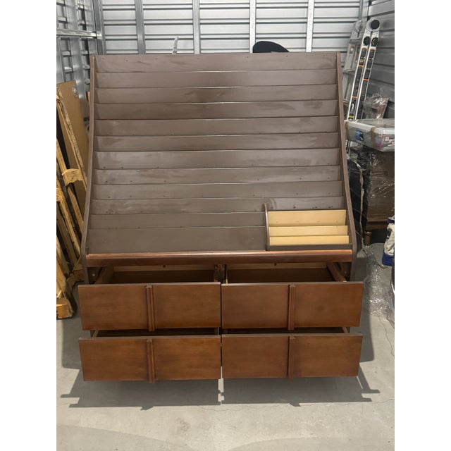 Vintage greeting card rack. I used it to display LPs. Comes with four drawers of additional storage. 48” wide 56” tall 24”...
