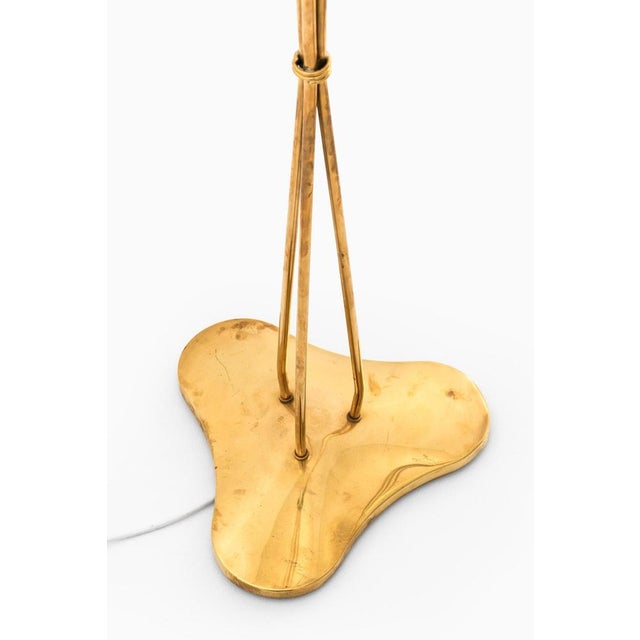 This exceptionally rare floor lamp, designed by hans bergström and produced by asea in sweden, is a refined example of...