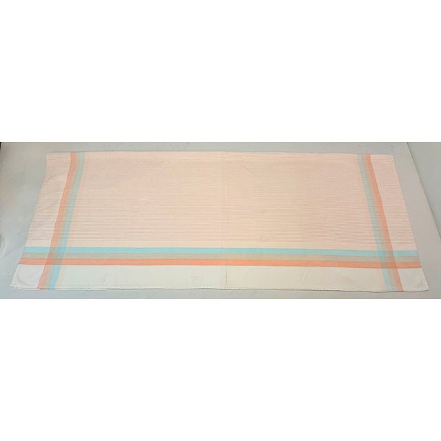 Pretty in Pink! That's exactly how your table will feel dressed in this vintage yarn dyed cotton tablecloth with a pattern...