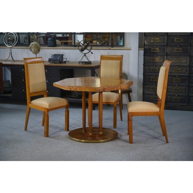 Octagonal burl wood table with a column base, inspired by Art Deco. A superb table with an octagonal burl wood top (thick...