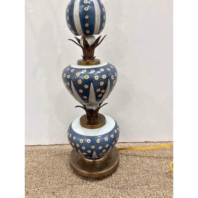 Stylish Currey & Co Porcelain Painted Lamp, Blue & White Painted porcelain table lamp with stacked decorative spheres,...