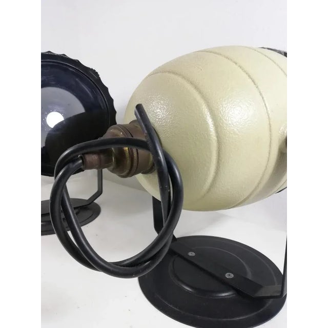 Pair of safety lamps used in darkrooms to avoid accidental combustion with the fumes given off by the acids used for...