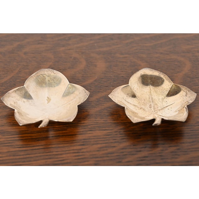 A gorgeous pair of Art Deco period sterling silver leaf-shaped catchall trays or jewelry dishes By Tiffany & Co. (signed...