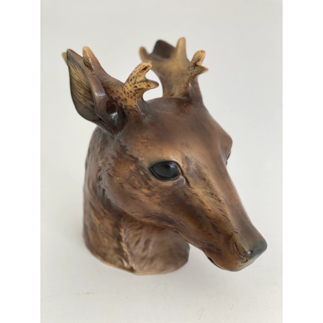 This amazing reindeer figural vase has extraordinary life-like qualities and hand-painted details. Numbered to the underside.