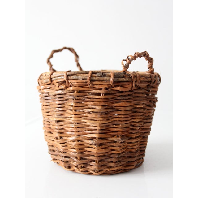 Vintage Handwoven Wicker Basket With Twisted Handles For Sale - Image 11 of 11