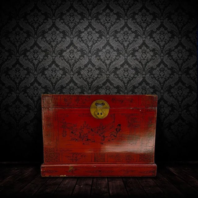 This red storage trunk is decorated with hand painted kids playing in the court yard and a adult reading. This red accent...