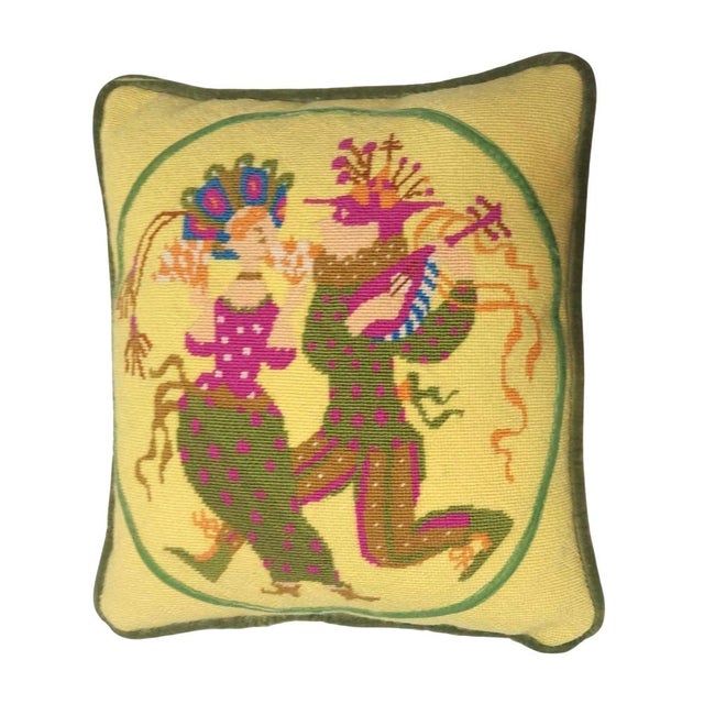 Yellow background with a female and male jester or clown on the front. The back is a green velvet or velour material....