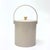 Taupe ice bucket. This 1970s-lidded acrylic ice bucket by Irvinware features a mushroom taupe colorway with gold hardware....