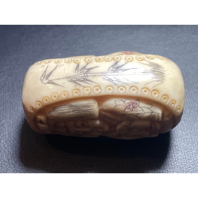 Late 19th Century Antique Carved Ojime Bead Depicting a Smiling Figure Holding a Coin. 19th Century Japanese Edo Style. For Sale - Image 5 of 7