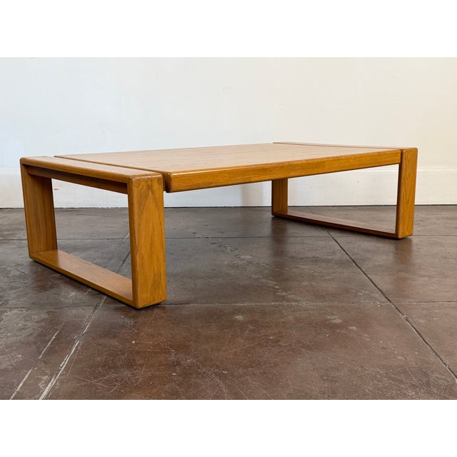 1970's oak waterfall coffee table designed by Lou Hodges for California Design Group in good vintage condition. Minor...