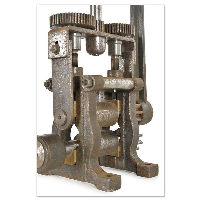A testament to the craftsmanship of the early 20th century, this two-crank rolling mill combines mechanical robustness and...