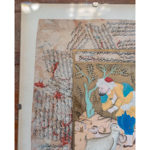 We are selling this painted illuminated book page probably from the Quran. We believe this book page to be Persian,...