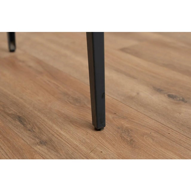 Industrial desk by Marko. The desk comes with a wooden surface on a metal frame. This piece has an attribution mark, I am...