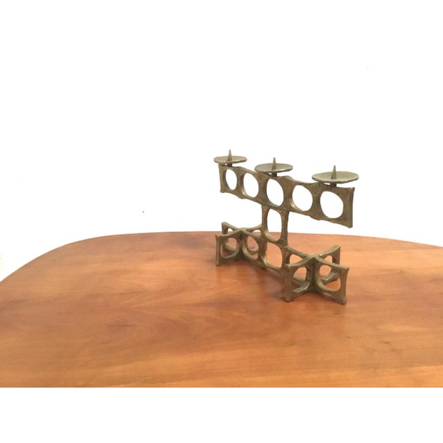 This superb Atomic and Brutalist styled brass candleholder is in the style of Paul Evans and is signed 'G36'. This piece...
